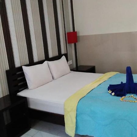 Cinthya Guest House Легиан Экстерьер фото
