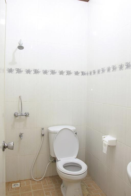 Cinthya Guest House Легиан Номер фото