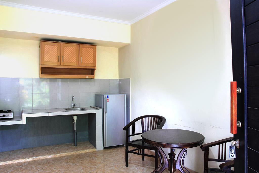 Cinthya Guest House Легиан Номер фото