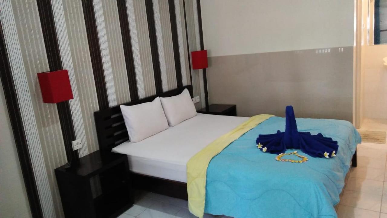 Cinthya Guest House Легиан Экстерьер фото